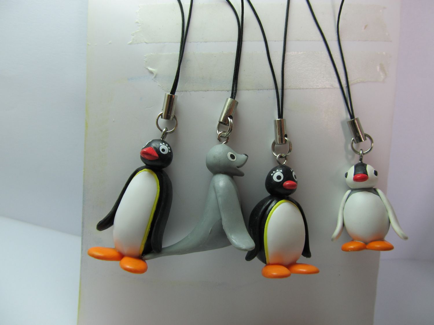 Custom Keychain Pendants in Various Designs, Including Characters, Animals, and Plants.